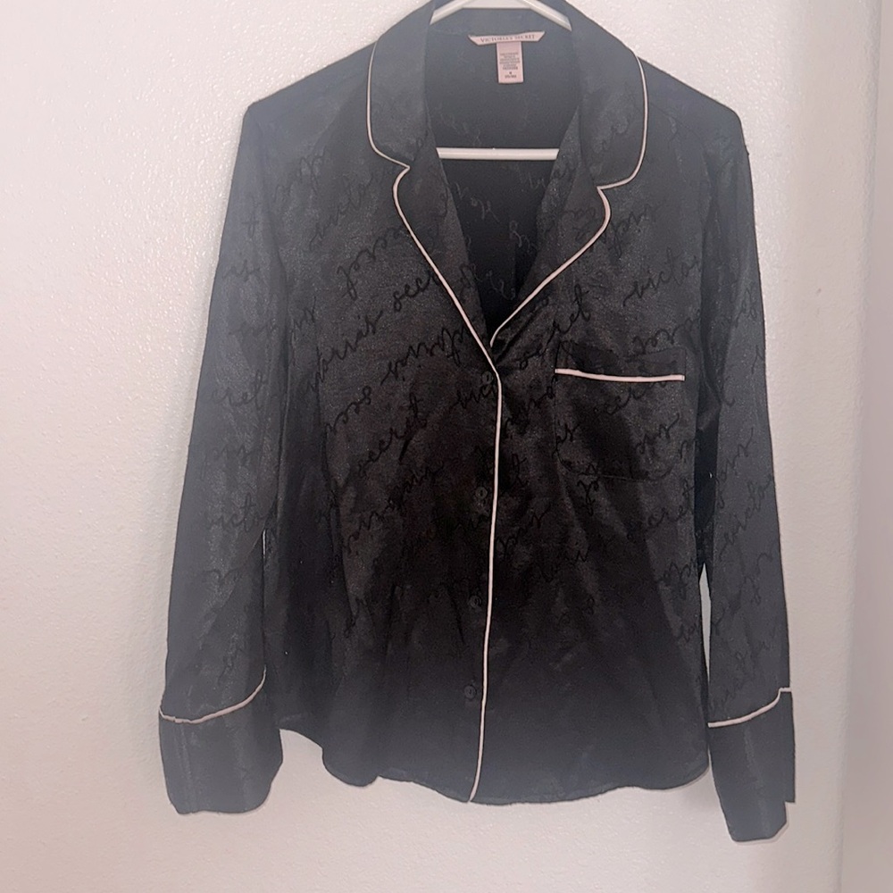 Black satin Victoria’s Secret pajamas, long sleeved buttons size Medium.
